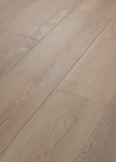 an image of wood flooring that looks like it has been painted in light brown