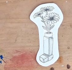 a drawing of a vase with flowers in it