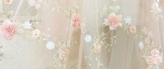 pink and white flowers on sheer fabric