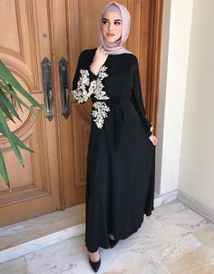 Elevate your style with our Embroidered Abaya Kaftan Dress with Waist Tie for Women! ✨ This elegant ensemble exudes sophistication and charm, perfect for both casual and special occasions. Step out with confidence and make a statement in this timeless piece! 👗🌟 https://www.arabicattire.com/products/embroidered-abaya-kaftan-dress-with-waist-tie-for-women #ArabicAttireEmbroideredElegance #AbayaKaftanDress #EffortlessChic Dubai Hijab, Islamic Clothing Women, Embroidery Abaya, Embroidery Kaftan, Habits Musulmans, White Pencil Dress, Muslim Long Dress, Dress Islamic, Dresses Materials