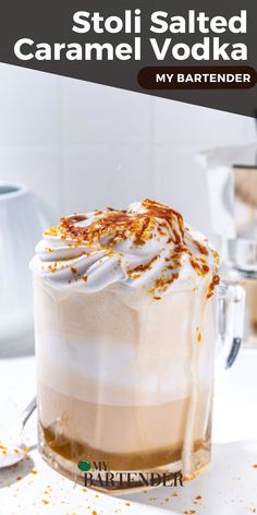 a glass mug filled with caramel vodka and whipped cream