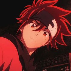 an anime character with red hair and black eyes looking at something in front of him