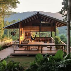 a wooden deck with hammock hanging from it