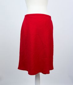 "- Classic red A-line mini skirt - Excellent condition (please see pictures) - 100% virgin wool, acetate lining - Tag size S (please see measurements) Measurements (flat): Waist: 35 cm / 13.8 inches Length: 55 cm / 21.7 inches Bottom width: 60 cm / 23.6 inches RESERVATIONS are available, please contact me for details. SHIPPING INFO: Shipping price in the listing is for the \"Standard Latvian post shipping\". Includes tracking info and takes: * 5 business days within European Union * 10-15 busine Red Winter Skirt With Relaxed Fit, Elegant Red Mini Skort, Red Knee-length Lined Mini Skirt, Red Flared Skirt For Work, Red Relaxed Fit Knee-length Mini Skirt, Red Flowy Skirt For Workwear, Red A-line Skirt For Workwear, Red Relaxed Skort With Lined Skirt, Classic Red Winter Skirt