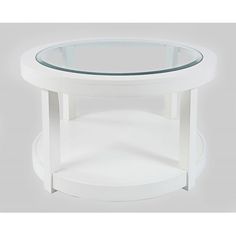 a white coffee table with a glass top