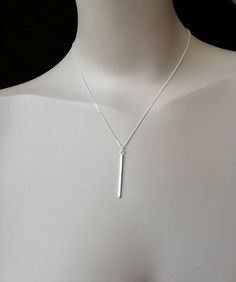 Sterling silver bar necklace, Simple, modern and minimalist, polished to a high shine. Post length 3.5 cm.   The sterling silver curb chain comes in a choice of lengths 16 and 18 & 22 inches. All Karmasilver Jewellery is handmade in the UK using traditional silversmithing techniques. Longer bar necklace 4.5 cm. https://www.etsy.com/listing/1540094447/long-bar-necklace-modern-925-sterling Hammered bar necklace https://www.etsy.com/uk/listing/1185461316/long-hammered-bar-necklace-modern-925?ref=li Edgy Necklace, Silver Ball Necklace, Sterling Silver Bar Necklace, Necklace Bar, Long Silver Earrings, Vertical Bar Necklace, Stick Earrings, Star Charm Necklace, Cuff Bracelets Handmade