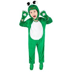 a child in a green frog costume with his hands up to his head and eyes closed