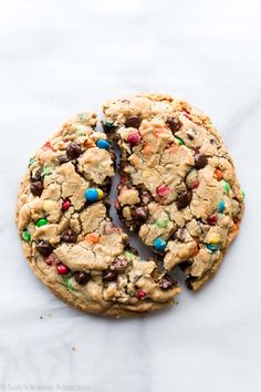 a cookie that has been cut in half and is sitting on top of a table