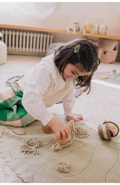 This sweet textile playset stimulates imagination and interactive play. The set includes a cute cotton basket, three mushrooms and a soft snail to play with. This base easily folds and ties up while keeping the accessories inside for easy-to-carry playtime. Includes cotton basket, three mushrooms and a soft snail 97% cotton, 3% other fibers Spot clean Imported Snail Trail, Cotton Basket, Autumn Woods, Kids Area Rugs, Baby Icon, Lorena Canals, Green Toys, Playroom Furniture, Interactive Play