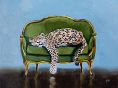 a painting of a leopard laying on a green couch