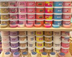 there are many ice creams on the shelves