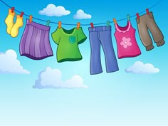 clothes hanging on a line with clouds in the background