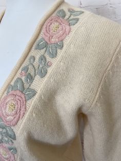 "Retro womens Evan Picone cardigan Pale pastel yellow sweater is nicely embroidered with light pink and green flowers and leaves Pearl buttons Excellent vintage condition. Slight hole at bottom front by side seam, hardly noticeable. See photo #6 (ribbed waist area) Tag size Medium 95% Lambswool 5% Nylon Measurements when laying flat across: Bust - 20\" Sleeve length - 21\" Length - 22.5\" Waist - 15\"" Pastel Yellow Sweater, Pink And Green Flowers, Giraffe Print, Vintage Vanity, Summer Blouses, Yellow Sweater, Pastel Yellow, Pearl Buttons, Green Flowers