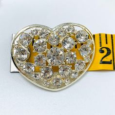 Vintage Sweetheart Rhinestone Silver Tone Heart Brooch Measures 1 3/4 no Missing Stones no wear marks very sweet and lovely brooch Heart-shaped Brooch For Anniversary On Valentine's Day, Silver Heart Brooch For Valentine's Day, Heart-shaped Brooch For Valentine's Day Anniversary, Heart-shaped Brooches For Valentine's Day Anniversary, Heart-shaped Valentine's Day Party Brooches, Heart-shaped Wedding Brooches For Valentine's Day, Valentine's Day Silver Heart Brooch, Silver Heart-shaped Brooch For Valentine's Day, Heart Rhinestone