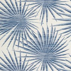 a blue and white wallpaper with palm leaves on the backgroung surface