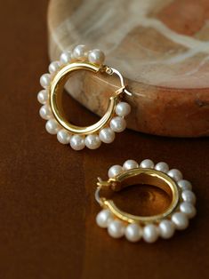 Elegant, timeless and beautiful — House of Pearls’ Circle Pearl Earrings are the perfect way to add a touch of sophistication to your formal look. Crafted with a timeless gold vermeil finish, these earrings feature a perfect circle of lustrous pearls that shimmer gracefully in the light. Whether you wear them with casual wear or a special occasion look, these earrings add a touch of poise to any ensemble. Details: Style ADiameter: 2.8cm Weight: 2.5g per earring Style BDiameter: 3.5cm Weight: 9.6 Copper Plating, Perfect Circle, Hoop Earrings Gold, A Perfect Circle, Pearl Hoop Earrings, Everyday Accessories, Classic Gold, Copper Plated, Gold Hoops