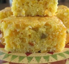 three pieces of cake sitting on top of a plate