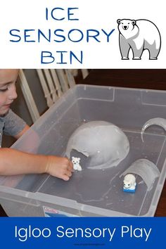 a young boy playing with an ice and snow play set in a plastic container that is filled with toys