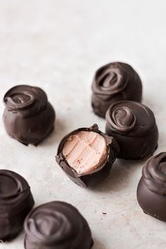 there are chocolates that have been cut in half and placed on the counter top