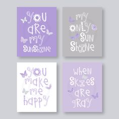 four purple and gray nursery wall art prints