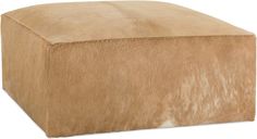 a cow hide ottoman is shown on a white background and it's brown color