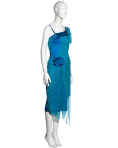 For Sale on 1stDibs - ▪ Issey Miyake blue silk mesh ▪ Draped mesh overlay ▪ Floral corsages ▪ Asymmetric neck and hemline ▪ Size JP 2 - Medium ▪ Spring-Summer 2005 ▪ 100% Silk Elegant Blue Mesh Dress For Party, Elegant Blue Mesh Dress For Summer, Elegant Blue Mesh Summer Dress, Blue Sleeveless Silk Chiffon Dress, Blue Sheer Silk Dress, Elegant Blue Mesh Dress For Spring, Blue Silk Chiffon Evening Dress, Fitted Blue Sheer Evening Dress, Sheer Blue Evening Dress