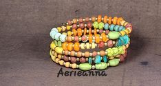 Beaded Memory Wire Bracelet Five Row Tropical Paradise Memory Wire Wrap Bracelet Five wraps around your wrist with tropical colors in beads in all shapes and sizes. Some are rondelle, some round, some heishi. Mellow summer colors in matte finish; lemon and lime, tangerine and banana with pomegranite, blueberry and raspberry with a side of mint. Little brass beads separate them all. Light on the wrist, easy on, easy off.  This one will fit 7 to 9" wrists. It is 2 1/2" across and easily expandable. Bohemian Rainbow Beaded Bracelets For Jewelry Making, Bohemian Multicolor Wire Wrapped Beaded Bracelets, Bohemian Hand-strung Rainbow Bracelet, Bohemian Rainbow Hand-strung Bracelet, Bohemian Multicolor Wire Wrapped Bracelets, Bohemian Wire Wrapped Bracelets For Beach, Bohemian Wire Wrapped Beaded Bracelets For Beach, Bohemian Wire Wrapped Bracelet For Beach, Bohemian Friendship Bangle Bracelets With Spacer Beads