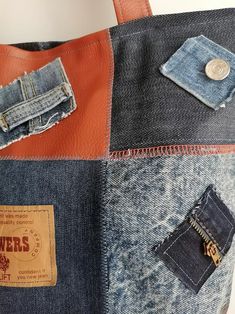 an image of a bag made out of jeans with patches on the back and sides