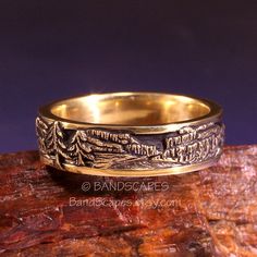 This is a landscape band in my series of scenic wedding rings, featuring lands of Utah and of the great south west. A band with some extremely detailed carving including Zion, Bryce and Arches. The picture does not repeat in any way as it goes around the finger. See photos as I have rotated the band in each photo. I sculpt all of my designs by hand, using small tools that I make myself. No CAD/CAM is involved in any way. These rings are truly handmade. The band has a formal polished border which Unique Engraved Etched Wedding Ring, Unique Engraved Ring For Wedding, Unique Engraved Wedding Ring With Etched Design, Artisan Engraved Ring For Wedding, Artisan Etched Jewelry For Wedding, Unique Carved Engraved Wedding Ring, Southwestern Engraved Rings For Anniversary, Southwestern Engraved Round Rings, Detailed Wedding Band