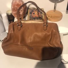 This Handbag Is So Cute And In Fantastic Condition! Has Only Ever Been Used A Couple Times But Has A Brand New Feel To It! Coach Shoulder Bag With Detachable Strap For Travel, Coach Travel Shoulder Bag With Detachable Strap, Coach Hobo Tote Bag For On-the-go, Brown Shopping Bag With Detachable Handle, Tan Satchel With Detachable Strap For Everyday Use, Everyday Tan Satchel With Detachable Strap, Tan Hobo Bag With Removable Pouch For Travel, Coach Top Handle Shoulder Bag For Travel, Coach Double Handle Shoulder Bag For On-the-go