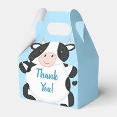 a blue and white cow themed thank you box