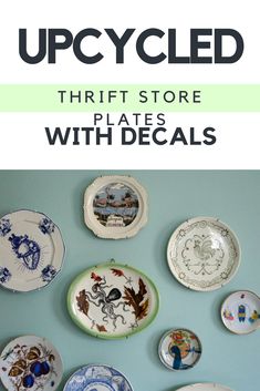 plates on the wall with text overlay that reads upcycled thrift store plates with decals