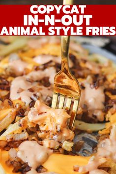 a fork is stuck in an animal style fries