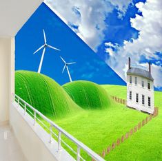 a room with green grass and windmills painted on the wall