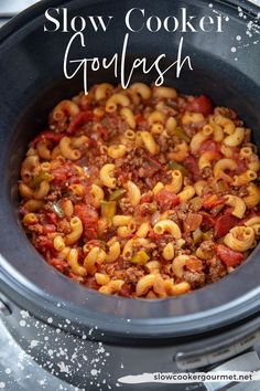 slow cooker goulash with pasta and meat in it, ready to be eaten