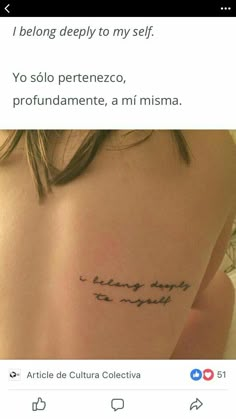 the back of a woman's shoulder with words written in cursive writing