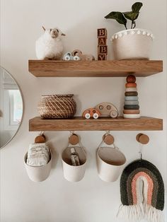 two wooden shelves filled with toys and other items