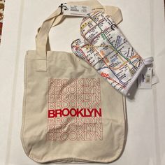 A Great Nyc-Centric Gift For A Friend Or Yourself! Nyc Subway, Gift For A Friend, Kitchen Linens, Oven Mitts, Bag Design, Tote Bag Design, Cream White, Brooklyn, Bags Designer