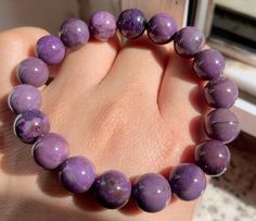 Material:Natural Sugilite Gemstone size :  11mm   quantity: one strand 6mm approx 29 pcs one strands 7mm approx25 pcs one strands 8mm approx 22 pcs one strands 9mm approx 21pcs one strands 10mm approx 19 pcs one strands 11mm approx 18pcs one strands 12mm approx 16 pcs one strands 13mm approx 16 pcs one strands 14mm approx 15 pcs one strands 15mm approx 14pcs one strands 16mm approx 14 pcs one strands 17mm approx 13pcs one strands 18mm approx 13pcs one strands 19mm approx 12pcs one strands 20mm a Purple Agate Beaded Bracelets As A Gift, Bracelet For Friends, Purple Agate Bracelets, Elegant Purple Faceted Beads Gemstones, Hand-strung Brown Agate Beads, Artisan Brown Oval Beads, Gems, And Cabochons, Brown Large Oval Beads, Gems, And Cabochons, Large Spiritual Agate Beads, Gems, And Cabochons, Bracelet Jewelry