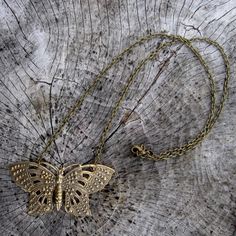 Large ornate oxidized brass Victorian butterfly measuring about 57x32mm. On 16 inches of antiqued brass chain. Antique Gold Copper Necklace, Handmade Gold Bohemian Butterfly Necklace, Bohemian Gold Butterfly Jewelry, Gold Nickel-free Butterfly Necklace, Antique Gold Filigree Brass Necklace, Nickel Free Gold Butterfly Necklace, Vintage Handmade Butterfly Necklace, Gold Bohemian Butterfly Necklace, Nickel-free Brass Butterfly Jewelry