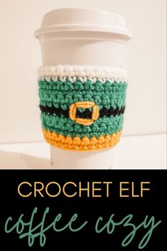 crocheted coffee cup cozy with the words crochet elf coffee cozy on it