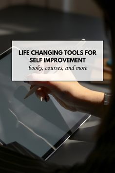 a person holding a tablet with the text life changing tools for self improvement books, courses, and more