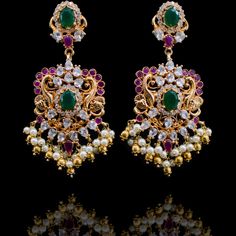 Channel ethereal beauty in this mesmerizing handcrafted masterpiece! Look effortlessly elegant in our Lamisah Set featuring delicate details and adorned with ruby, emerald and CZ stones. The set includes a pair of matching earrings. Approximate earrings length is 3". Gold-plated on high-quality brass as base metal. Lamisah Set (Ruby) is in-stock & ready-to-ship. Delivery time frame for Lamisah Set (Emerald) & Lamisah Set (Sapphire) is 4-6 weeks. For custom or urgent requests, please contact supp Ruby Emerald, Faux Stone, Ethereal Beauty, Delicate Details, Cz Stone, Base Metal, Matching Earrings, Statement Necklace, Ruby