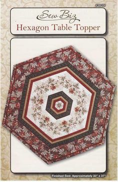 the hexagon table topper is shown in red, white and brown colors