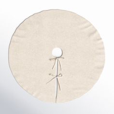 a white round object with a stick sticking out of it's center and string