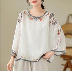 Details: Type: Women Loose Embroidered Cotton T-Shirts Material: Cotton Sleeve Length: 3/4 Sleeves Pattern: Embroidered Color: White, Gray, Apricot Style: Loose Size Bust Length cm inch cm inch M 118 46.46 60 23.62 L 122 48.03 61 24.02 XL 126 49.61 62 24.41 2XL 130 51.18 63 24.80 Summer Floral Embroidery Half Sleeve Tops, Long Sleeve Tops With Geometric Embroidery For Summer, Casual Blouse With Floral Embroidery And Half Sleeves, Embroidered Half Sleeve Top For Summer, Embroidered Half Sleeve Cotton Tops, Summer Tops With Floral Embroidery And 3/4 Sleeve, Summer Floral Embroidery 3/4 Sleeve Tops, White 3/4 Sleeve T-shirt For Summer, Embroidered Half-sleeve Tops For Spring