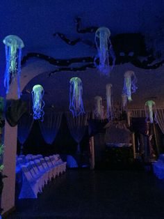 jellyfish lights are hanging from the ceiling