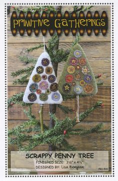 two christmas trees made out of buttons are shown in front of a wooden background with text that reads primitive gatherings scrappy penny tree