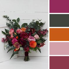 a bouquet of flowers is shown in the color purple, orange, and pinks