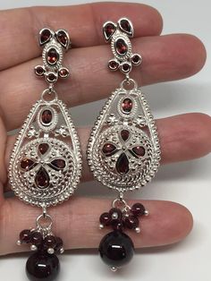 Vintage 925 Sterling Silver Bohemian Garnet dangle Chandelier Earrings Lovely handmade silver work About 2.5 inch 92.5% Sterling Silver All jewelry is shipped free in the US in a nice gift box. Check out our over a THOUSAND great reviews Sterling Silver Festive Dangle Chandelier Earrings, Sterling Silver Dangle Chandelier Earrings For Festive Occasions, Sterling Silver Chandelier Earrings With Latkans As Gift, Sterling Silver Festive Drop Chandelier Earrings, Traditional Sterling Silver Teardrop Chandelier Earrings, Traditional Teardrop Sterling Silver Chandelier Earrings, Traditional Sterling Silver Teardrop Earrings, Silver Teardrop Chandelier Earrings With Latkans, Festive Sterling Silver Chandelier Earrings For Pierced Ears